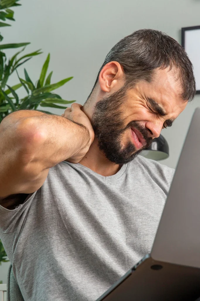 Man With Torticollis Holds Neck In Pain